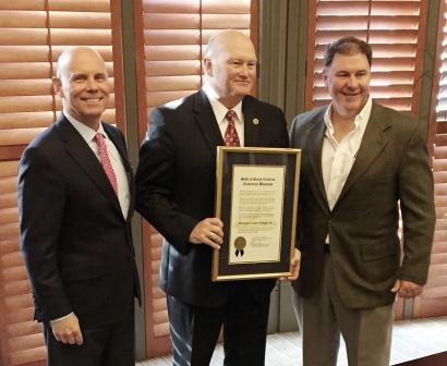 Secretary Hammond presents award to Burroughs & Chapin Company