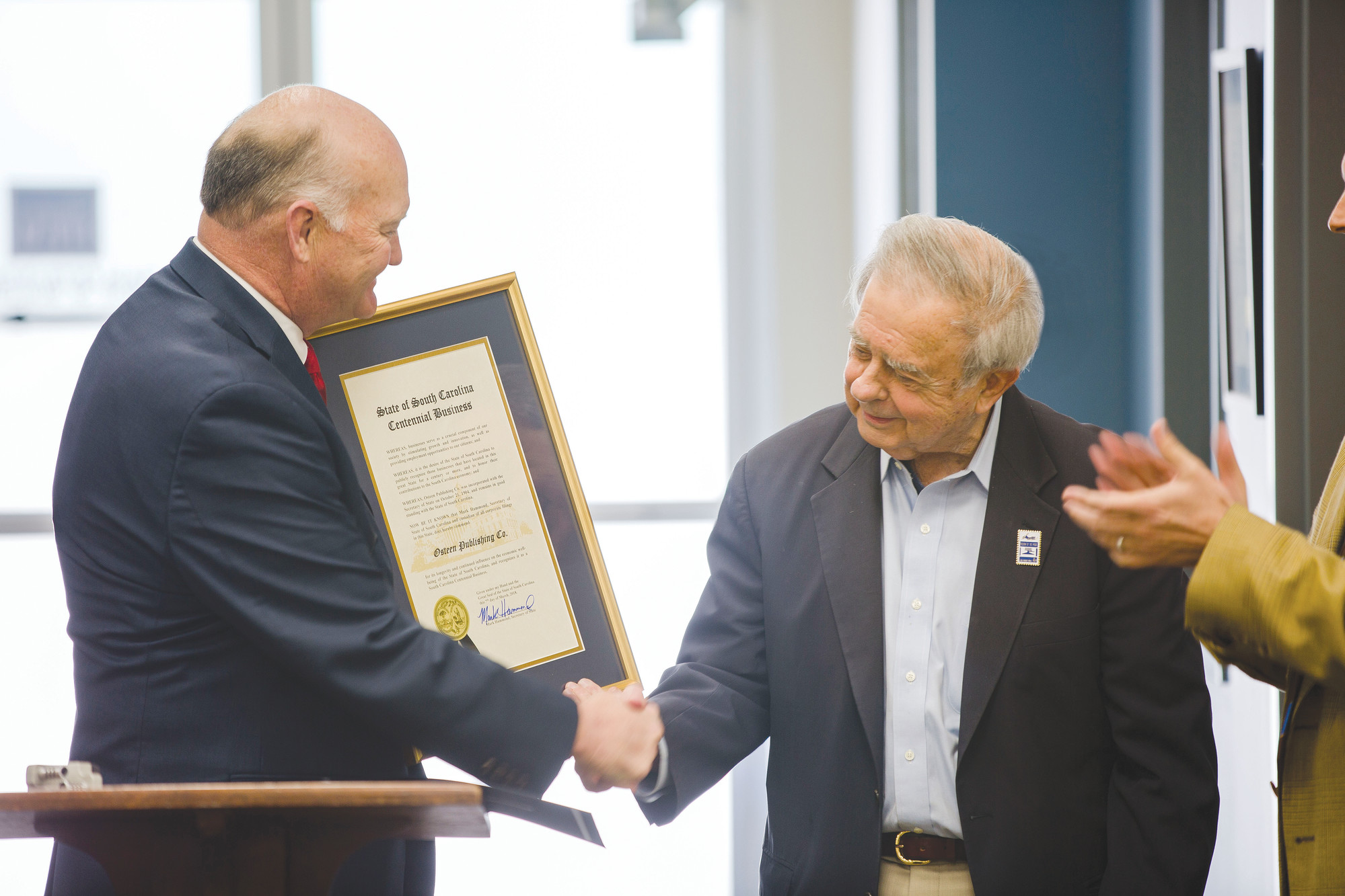 Presenting the Centennial Business award to Osteen Publishing Company